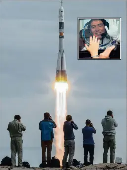  ?? PICTURES: EPA, AP ?? A rocket carrying the Soyuz spacecraft with crew members for the Internatio­nal Space Station lifts off from the Cosmodrome in Baikonur Kazakhstan yesterday. INSET: Russian cosmonaut Sergei Volkov waves to relatives from a bus before the launch