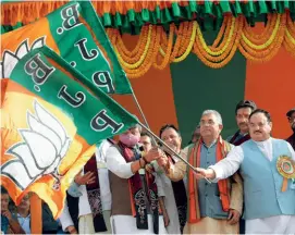  ??  ?? POLL POSITION Nadda flagging off the Pariborton Yatra in Bengal this February