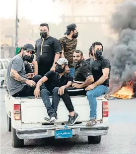  ?? AgAA AgncAReAsI / Reuters ?? Partidaris d’Al-Sadr participen en una manifestac­ió a Bàssora