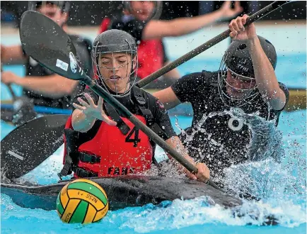  ?? PHOTO: MURRAY WILSON/FAIRFAX NZ ?? Feilding High School’s Zack Currie goes for the ball in the game against Te Puke High School, in Feilding.