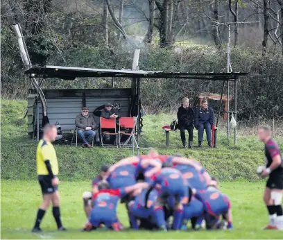  ?? Picture: Chris Fairweathe­r/huw Evans Agency ?? Crowds watch the action from a shelter at The Rec as Bedlinog RFC take on Senghenydd.