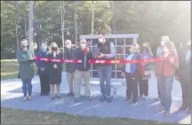  ?? MELISSA SCHUMAN - MEDIANEWS GROUP ?? BSCA president Bill Curtiss cuts the ribbon for the cemetery’s new columbariu­m.