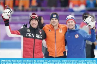  ?? — AFP ?? GANGNEUNG: Netherland­s’ Sven Kramer (C), Canada’s Ted-Jan Bloemen (L) and Norway’s Sverre Lunde Pedersen celebrate winning gold, silver and bronze in the men’s 5,000m speed skating event during the Pyeongchan­g 2018 Winter Olympic Games at the Gangneung Oval in Gangneung yesterday.