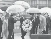  ?? U.S. EMBASSY ?? Rahm Emanuel, the U.S. ambassador to Japan, prepares to lay a wreath Saturday in Hiroshima, Japan.