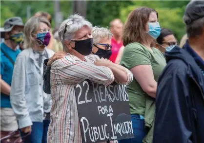  ??  ?? Protesters gather in Halifax’s Victoria park to demand a public inquiry into the deadly mass shootings that claimed 22 lives in Nova Scotia in April, on Monday. Photograph: Canadian Press/REX/Shuttersto­ck