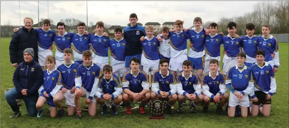  ??  ?? The Coláiste Bhrde Carnew under-16 hurling team with mentors Kevin Morris and Pat Nolan after their victory in Carlow.