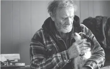  ?? BRANDON HARDER ?? George Moffatt and his dog Kricket had been living without heat or power for several months when his plight was the subject a story in the Leader-post. Since then, many people and organizati­ons have reached out to help turn on the heat and power and keep Moffatt’s larder stocked with food.