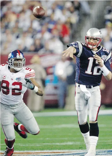  ?? —AP FILES ?? Michael Strahan, left, and Tom Brady were once fierce rivals battling it out for Super Bowl supremacy. Now they’re on the same side, producing the six-part series, Religion of Sports.