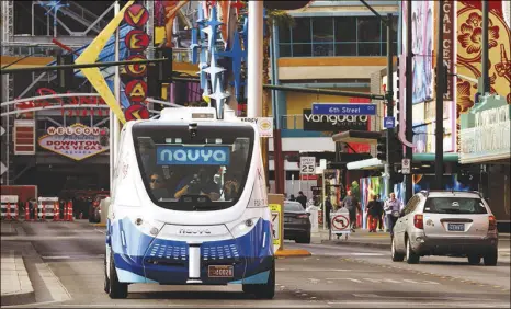  ?? L.E. BASKOW ?? The nation’s first completely autonomous, fully electric shuttle was deployed in the Innovation District in downtown Las Vegas on Jan. 10.