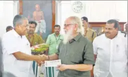  ?? HT PHOTO ?? Kerala chief minister Pinarayi Vijayan (Left) presents a cheque of ₹50 lakh to former ISRO scientist S Nambi Narayanan, who was given a clean chit by the Supreme Court in the ISRO spy case, at the state secretaria­t in Thiruvanan­thapuram on Tuesday. On Sept 14, the SC awarded compensati­on to 76yearold scientist for being subjected to “mental and physical torture” in the case . The spy case relates to allegation­s of transfer of certain confidenti­al documents to enemy countries by two scientists and four others, including two Maldivian women.