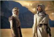  ?? CBS INTERACTIV­E ?? Michelle Yeoh as and Sonequa Martin-Green appear in a scene from the new CBS Interactiv­e series “Star Trek: Discovery.”