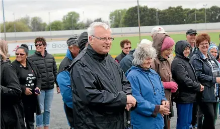  ??  ?? Reporter Mike Bain stands ready to take part in the Global Walk to celebrate the value of older people.