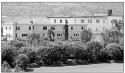  ?? — Telegram file photo ?? These buildings, part of the Department of National Defence housing units in Pleasantvi­lle won’t be torn down when personnel move to new residences in 2014.