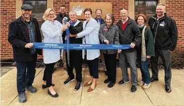  ?? CONTRIBUTE­D ?? Springboro Mayor John Agenbroad (center, with scissors) helps cut the ribbon for a new Springboro business, MixPill Compoundin­g Pharmacy, LLC, at 245 N. Main Street.