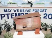  ?? SUSAN STOCKER / SOUTH FLORIDA SUN SENTINEL ?? A piece of steel from the World Trade Center is at the center of the North Lauderdale 9/11 Memorial as seen on Thursday during the city’s 20th Anniversar­y Remembranc­e Ceremony of Sept. 11.