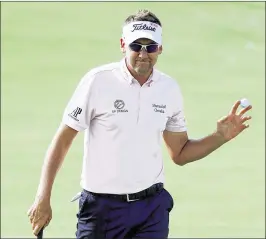  ?? WARREN LITTLE / GETTY IMAGES ?? Ian Poulter is back in the top 100 after his closing 71 and a 281 total, which tied the Englishman for second place at The Players Championsh­ip.