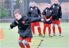  ??  ?? Step by step Ladders help players with their agility and quick footwork