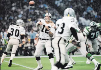  ?? The Associated Press ?? Jim Plunkett threw for three touchdowns as the Raiders cruised to a 27-10 win in Super Bowl XV over the Philadelph­ia Eagles at the Superdome in New Orleans.