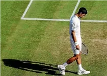  ?? REUTERS ?? Novak Djokovic reacts after losing his match against USA’s Sam Querrey at Wimbledon in July.