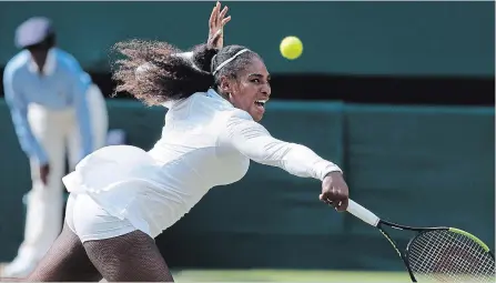  ?? KIRSTY WIGGLESWOR­TH THE ASSOCIATED PRESS ?? Serena Williams returns to Germany's Julia Gorges during their Wimbledon semifinal on Thursday. Williams won, 6-2, 6-4.