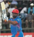  ??  ?? Afghanista­n’s man of the match Mohammad Shahzad