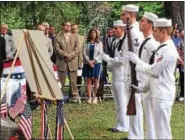  ??  ?? A U.S. Navy honor guard stands before a memorial to Petty Officer Francis Brown during a ceremony Thursday in Troy’s Prospect Park marking the 50th anniversar­y of Brown’s death in an attack on the USS Liberty by Israeli fighter jets and torpedo boats.