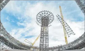  ?? MSG Sphere at The Venetian ?? Constructi­on crews place one of 32 massive roof trusses for the $1.66 billion MSG Sphere entertainm­ent venue. The roof framing is expected to be completed this summer.