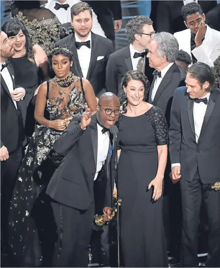 ?? Pictures: AP/Getty/PA. ?? Barry Jenkins, front left, and the cast of Moonlight accept the award for best picture after it was initially announced that the musical La La Land had won.