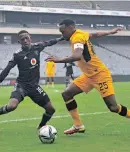  ?? Backpagepi­x ?? BERNARD Parker of Kaizer Chiefs challenged by Thabang Monare of Orlando Pirates at Orlando Stadium, Soweto yesterday.
| SYDNEY MAHLANGU