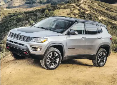  ??  ?? The new Jeep Compass resembles a smaller-scale version of the full-size Grand Cherokee.