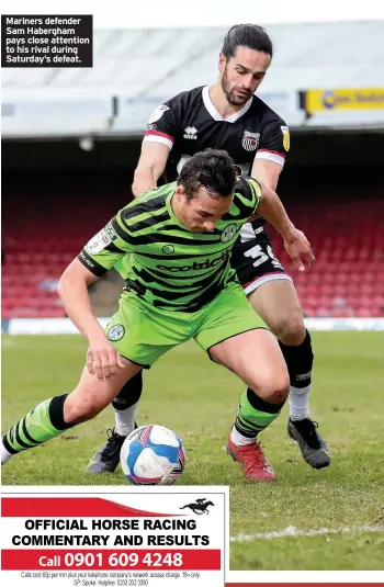  ??  ?? Mariners defender Sam Habergham pays close attention to his rival during Saturday’s defeat.