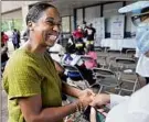  ?? Steven Senne / Associated Press ?? John Barros, left, and Andrea Campbell, right, are two of the five major candidates for mayor of Boston in next month’s contest.