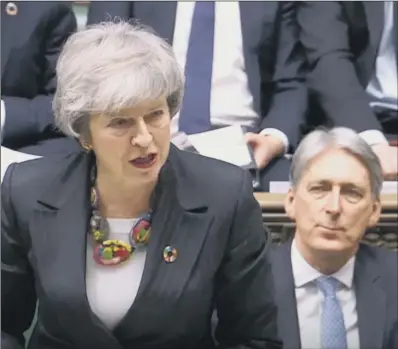  ?? PICTURE: PA ?? ‘PLAYING FOR TIME’: Prime Minister Theresa May gives a statement about progress on Brexit talks to MPs in the House of Commons.