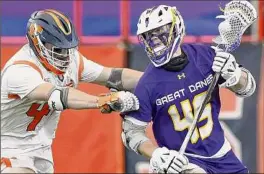  ?? Rich Barnes / Syracuse Athletics ?? Ualbany attack/midfielder Graydon Hogg, who played at Syracuse two years ago, will take on the Orange again on Friday night.