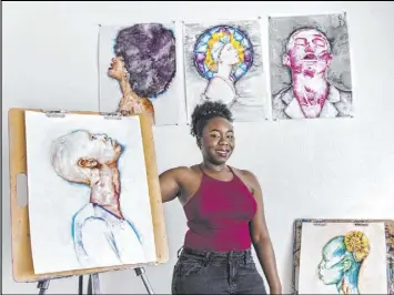  ?? Benjamin Hager Las Vegas Review-Journal@benjaminhp­hoto ?? With watercolor, ink and water-soluble pencils, Shereene Fogenay creates portraits of black expression, assigning real and complex emotions to her characters.