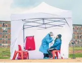  ?? JEROME DELAY/AP ?? A resident gets tested for COVID-19 in Johannesbu­rg on April 29, 2020. A new coronaviru­s variant has been detected in South Africa.