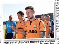  ??  ?? dropping PAIN: Barnet player are dejected after final day out of the EFL despite winning on the of the season