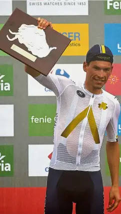  ??  ?? Aqua Blue’s Austrian Stefan Denifl celebratin­g on the podium after winning Stage 17 of the Vuelta A Espana on Wednesday. — AFP Good start: