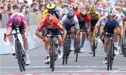  ?? Frustratio­n. Photograph: Maurizio Brambatti/EPA ?? Arnaud Démare (left) nudges ahead of secon- placed Australian rider Caleb Ewan (centre) as Mark Cavendish (right) grimace in