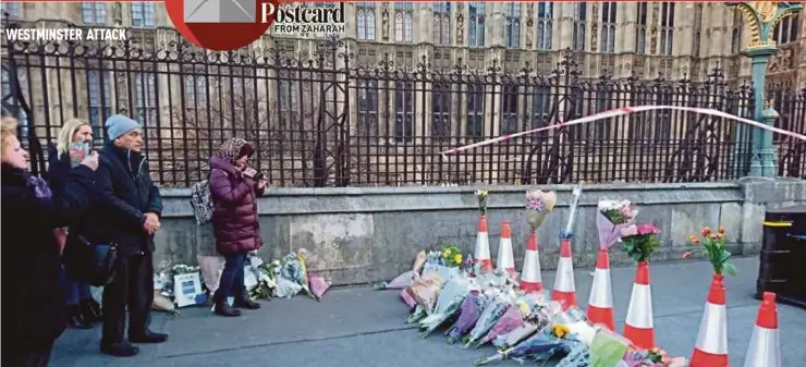  ?? PIC BY A. AHMAD TALIB ?? Bouquets placed at the site in Westminste­r, London, where a man recently mowed down pedestrian­s.