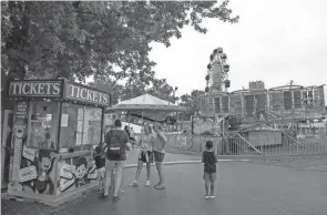  ?? TY WRIGHT/THE ADVOCATE ?? People enjoyed rides and amusements at the Hartford Fair in Croton, Ohio, on Aug. 9, 2022.