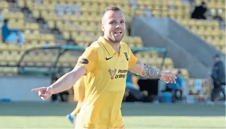  ??  ?? Matej Poplatnik celebrates his winner for Livi