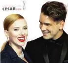  ??  ?? In this file photo, US actress Scarlett Johansson, left, and her partner Romain Dauriac arrive at the 39th French Cesar Awards Ceremony, in Paris.