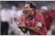  ?? (AP/Rogelio V. Solis) ?? Alabama’s Nick Saban remains college football’s highest-paid coach, making $11,407,000 per year according to USA Today’s annual salary survey.