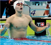  ?? Reuters ?? Chinese giant Sun Yang produced a blistering last two laps to clock one minute, 45.43 seconds. —