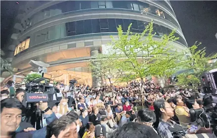  ?? NATTHAWAT WICHIEANBU­T ?? FFP supporters gather in front of the Thai Summit Tower in Bangkok following the party’s disbandmen­t.