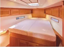  ??  ?? Hull number one sported a vast island bed topped with a memory foam mattress. It could be divided by a lee cloth for use at sea
