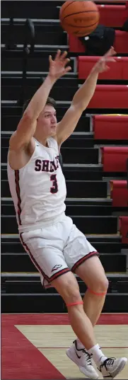  ?? CHUCK RIDENOUR/SDG Newspapers ?? Shelby’s Marshall Shepherd flips a pass to a teammate during a recent contest. The Whippets meet Huron tonight in the district semifinals at Ashland High School.