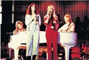  ??  ?? Thank you for the music: ABBA in the Seventies. The new exhibition includes (below, left to right) a suitcase taken on tour, a gold cape from 1977, and the gold disc for their first album Ring Ring