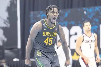  ?? TIM NWACHUKWU — GETTY IMAGES, FILE ?? Baylor’s Davion Mitchell (45) reacts during the 2021 National Championsh­ip game against Gonzaga at Lucas Oil Stadium in Indianapol­is on April 5.